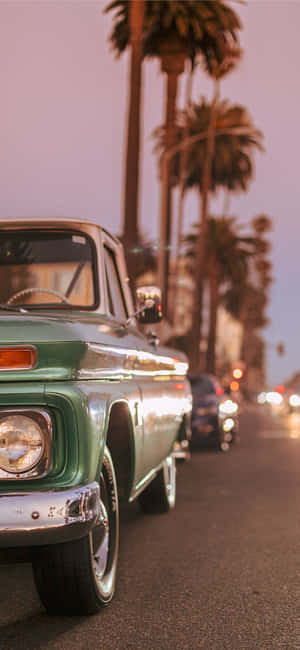 Vintage Truck Palm Lined Street Dusk Wallpaper