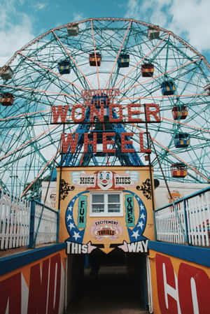 Vintage Wonder Wheel Entrance Sign Wallpaper