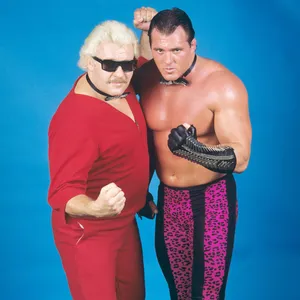 Vintage Wrestling Duo Pose Wallpaper