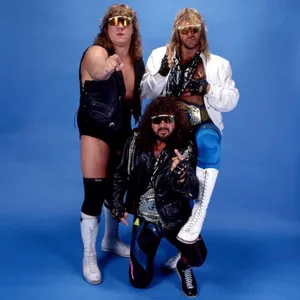 Vintage_ Wrestling_ Trio_ Pose Wallpaper