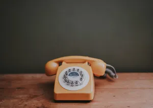 Vintage Yellow Rotary Phone Wallpaper