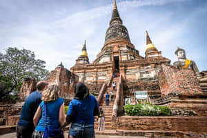 Visitors_at_ Ayutthaya_ Historical_ Park_ Thailand.jpg Wallpaper