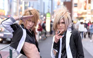 Visual Kei Artists Performing On Stage Wallpaper