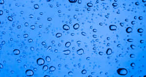 Vivid Red And Orange Hues In A Pastel Beach Landscape Wallpaper