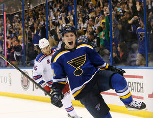 Vladimir Tarasenko Shouting Expression With Blues Crowd Cheering Wallpaper