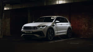 Volkswagen Tiguan Parkedin Dark Garage Wallpaper