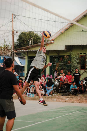 Volleyball Match At A Village Wallpaper