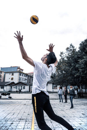 Volleyball Player On White Shirt Wallpaper