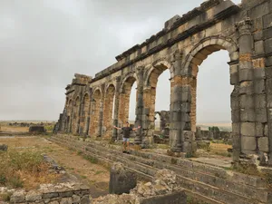 Volubilis Cloudy Sky Many Arches Wallpaper
