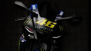 Vr46 Yahama Motorcycle With Monster Energy Logo Wallpaper