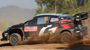 W R C Rally Car Action Dirt Track Wallpaper