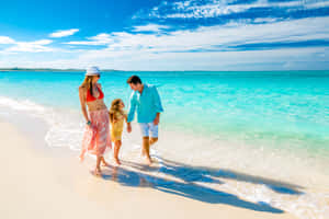 Walking Along A Breathtaking Beach Wallpaper