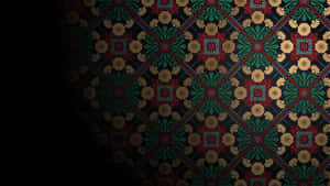 Wallpaper With A Black Background And Red And Green Designs Wallpaper