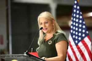 Wanda Vázquez Garced Speaking In Microphone Wallpaper