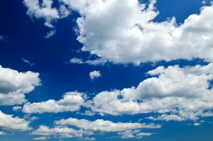 Wander Through Blue Skies Wallpaper