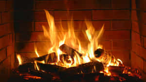 Warm And Inviting Fireplace Scene Wallpaper