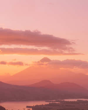 Warm Sunset Over Mountain Lake Wallpaper