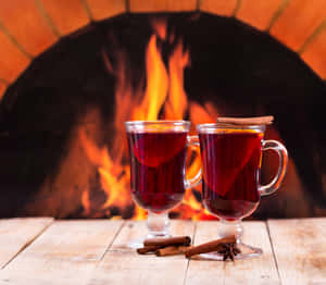 Warm Winter Drinks By The Fireplace Wallpaper