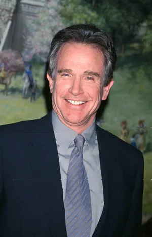 Warren Beatty In A Classic Black Suit Wallpaper