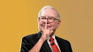 Warren Buffett Shh Hand Sign Photo Wallpaper