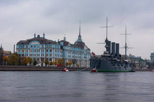 Warship Beside A Mansion Wallpaper