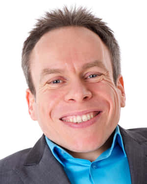 Warwick Davis Smiling At An Event Wallpaper