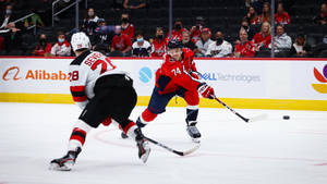 Washington Capitals John Carlson Versus New Jersey Devils Wallpaper