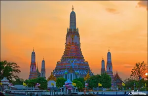 Wat Arun Against An Orange Sky Wallpaper