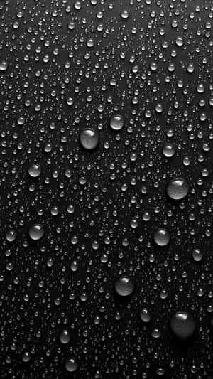 Water Drops On A Black Background Wallpaper