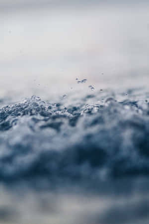 Water Splashing On The Surface Of The Ocean Wallpaper