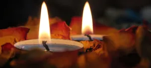 Waterfall And Bridge Over A Serene Lake Wallpaper