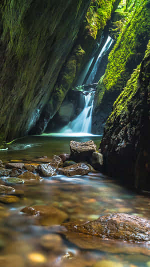 Waterfall Filling Both Sides Of An Iphone Wallpaper