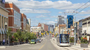 Waterloo Uptown Street Viewwith Tram Wallpaper