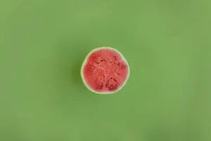 Watermelon Slice Green Background Wallpaper