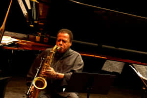 Wayne Shorter On Stage During A Performance Wallpaper