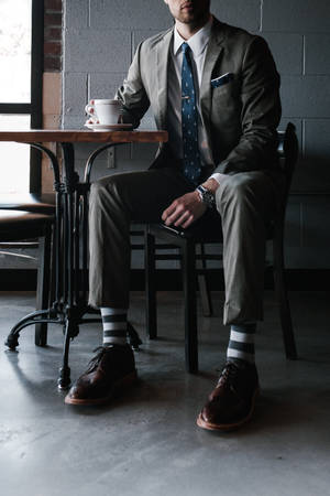 Wearing A Suit In Coffee Shop Wallpaper