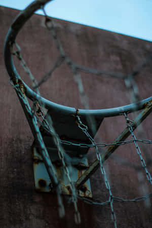 Weathered Outdoor Basketball Hoop Wallpaper