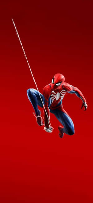 Web-slinging Superhero In Action Wallpaper