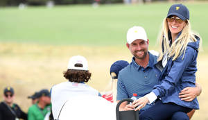 Webb Simpson Carrying His Wife Wallpaper