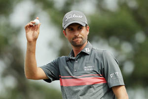 Webb Simpson Showing His Golf Ball Wallpaper