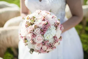 Wedding Bouquet In Bride's Hands Wallpaper