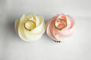 Wedding Rings On Pastel Flowers Wallpaper