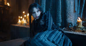 Wednesday Addams Candlelit Vigil Wallpaper