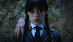 Wednesday Addams Forest Scene Wallpaper