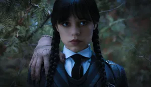 Wednesday Addams Forest Scene Wallpaper