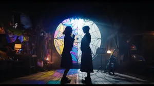 Wednesday Enid Stained Glass Scene Wallpaper