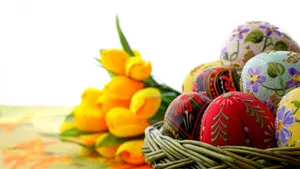 Welcome The Season Of Joy With Easter Eggs And Yellow Tulips! Wallpaper