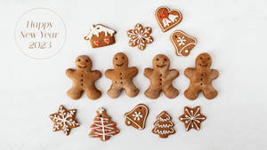 Welcoming New Year 2023 With Delicious Gingerbread Cookies Wallpaper