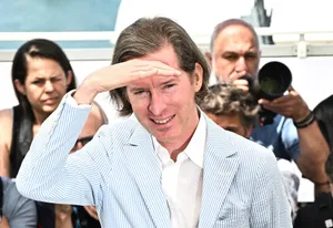 Wes Anderson Shielding Eyes Outdoors Wallpaper