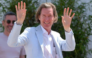 Wes Anderson Waving Happily Wallpaper